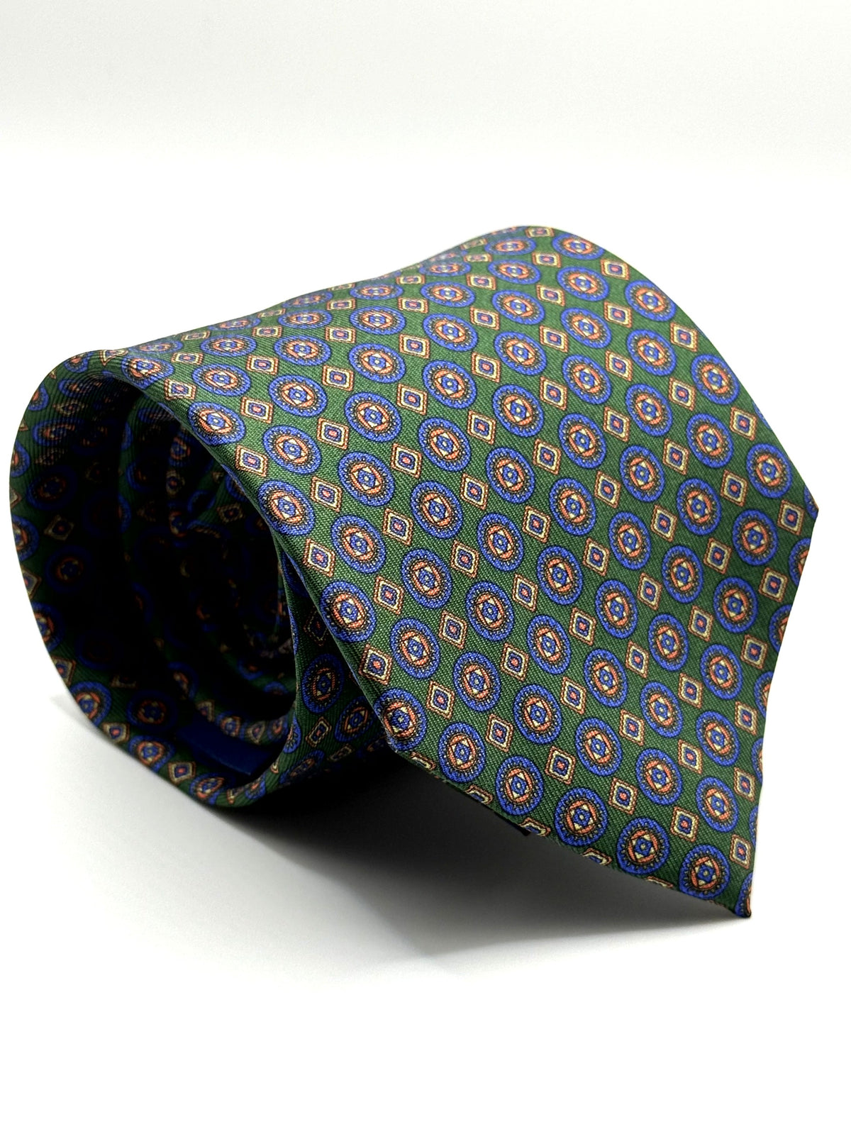 Corbata de seda Tartini verde con círculos azules y coral y pequeños rombos