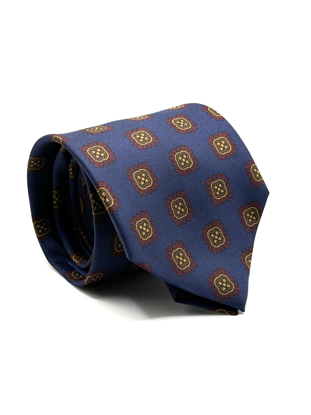 Corbata de seda Salieri azul marino con medallones burdeos y ocre